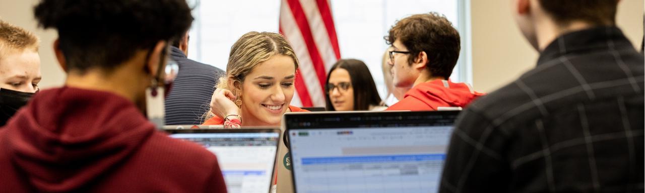 Student on their computer at Elect Her program